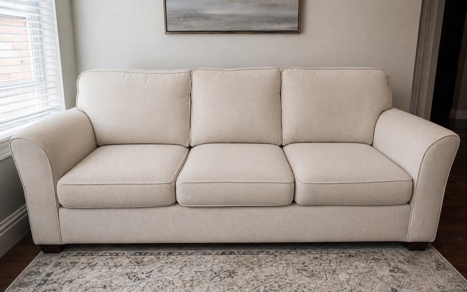 Light beige sofa after professional deep cleaning